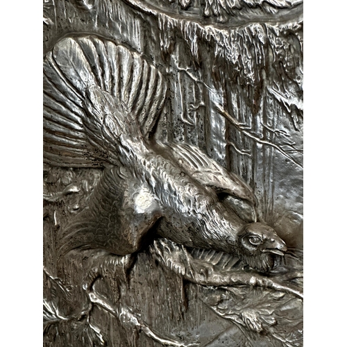 260 - Fitz Diller (1875-1945) - WMF silver plate repousse panel of a capercaillie, 40 x 32cm, framed