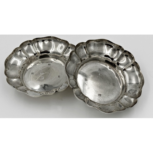 271 - A pair of silver bon bon dishes, Barker Ellis Silver Co., Birmingham 1973, wavy rim border, 15.5cm d... 