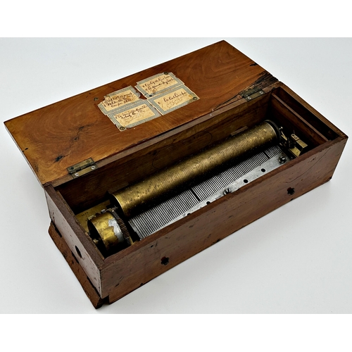 379 - Early walnut cased music box by Ami Rivenc, playing six airs, 40cm long