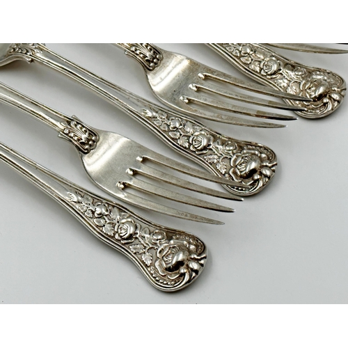 288 - Six Victorian Rose pattern silver table forks, Henry Lias & Son, London 1860, each with engraved ini... 