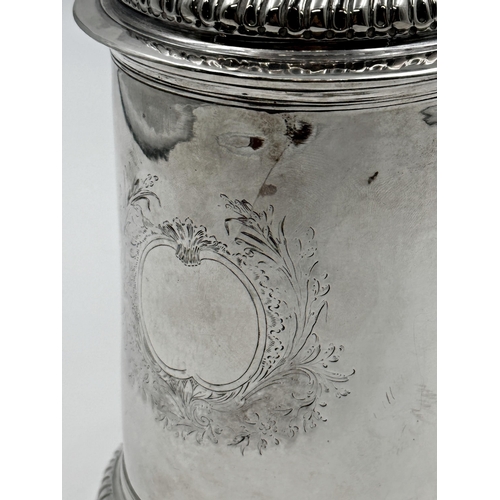 293 - A George III provincial silver lidded tankard, John Langlands I, Newcastle 1772, gadroon detail to l... 