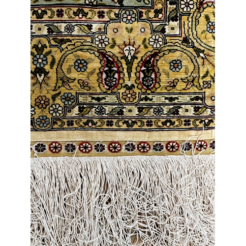 1403 - Incredible hand stitched Turkish Hereke silk rug from East Anatolia, with signature, scrolled floral... 