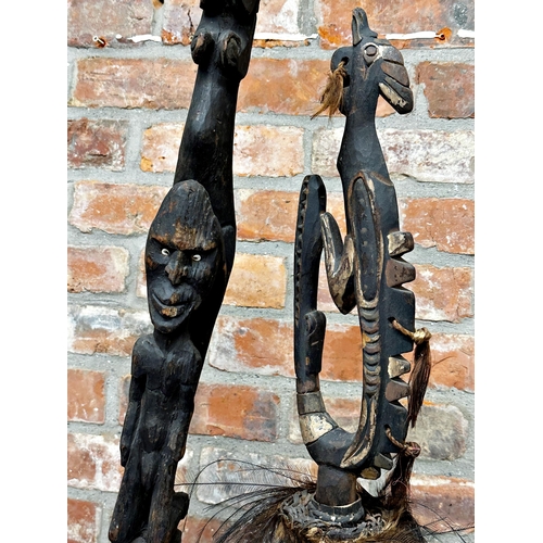 506 - Tribal - Two painted bamboo and wooden flutes with cockerel decoration on stands, Sepik River - Papu... 