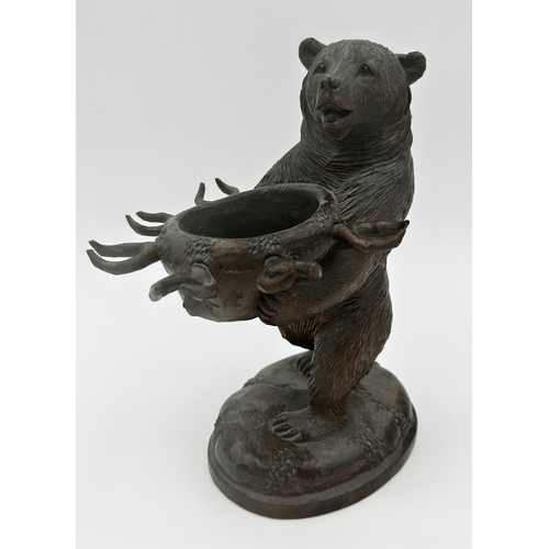 535 - Good Black Forest carved oak bear decanter holder, with small glass decanter and six harlequin glass... 