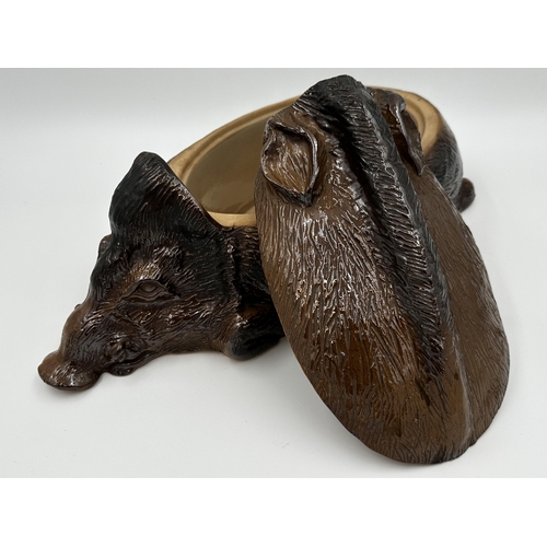 424 - Good quality pottery tureen in the form of a recumbent warthog or boar, 46cm long