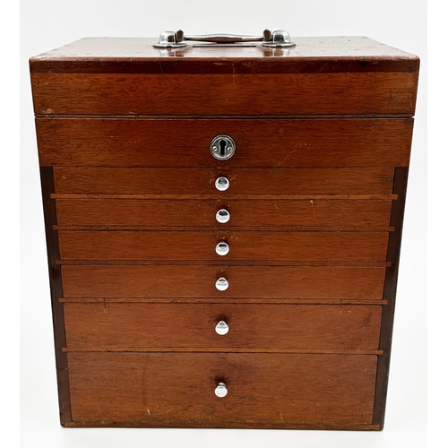 548 - Vintage teak cased travelling dentist cabinet by The S S White Co of London, hinged lid with six gra... 