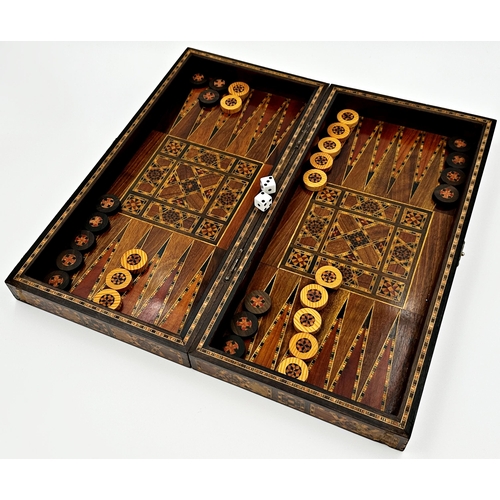 549 - Early 20th century parquetry games box, with parquetry counters, 41cm long