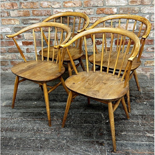 1200 - Set of four Ercol 'Cow Horn' light elm dining chairs