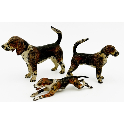 232 - Three Austrian cold painted bronzes of Foxhounds, the largest 6cm high x 8cm long (3)