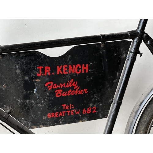 7 - Good early 20th century Butcher's delivery bicycle, with woven front basket and advertising panel in... 