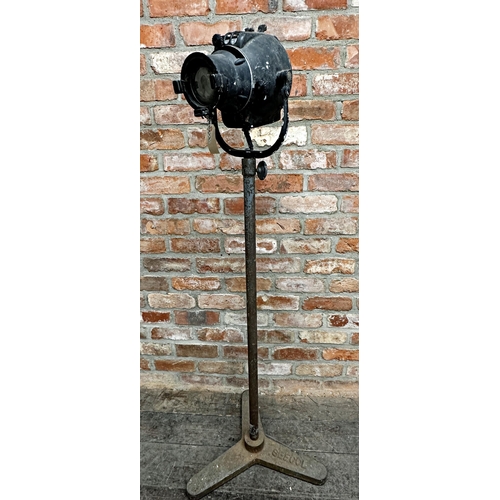 1121 - Strand theatre lamp upon a Seecol cast iron stand, 145cm high