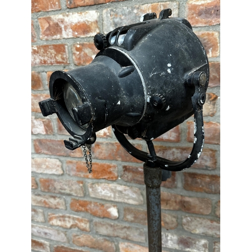 1121 - Strand theatre lamp upon a Seecol cast iron stand, 145cm high