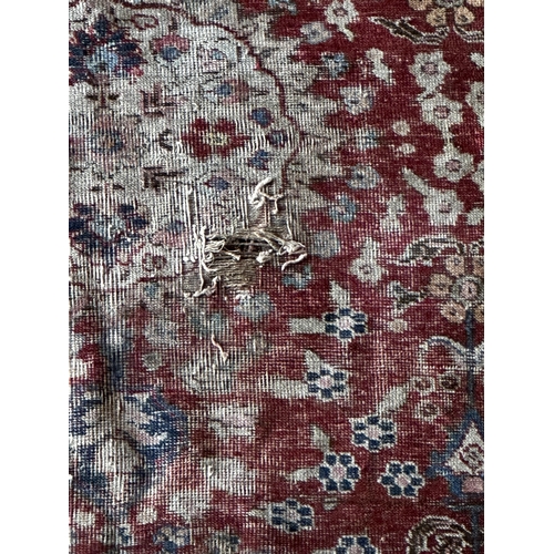 1413 - Old Mahal rug with typical Islamic scrolls on red ground, 180 x 145cm with a similar Tabriz rug (af)... 