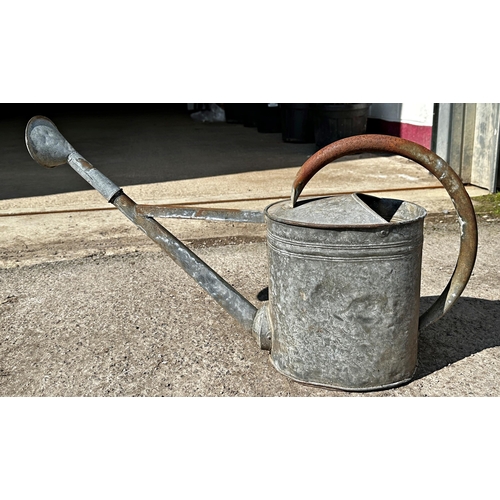 1052 - Galvanised watering can. Length 75cm x Height 42cm x Width 22cm