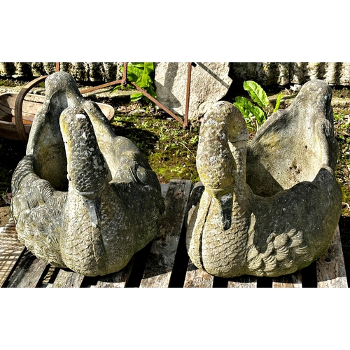 1057 - Pair of reconstituted stone planters in the form of swans, Height 49cm x Length 58cm x Width 42cm