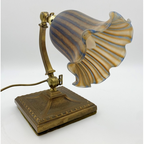 1124 - Good early 20th century Art Nouveau brass desk lamp, with hinged curved column and mottled glass sha... 