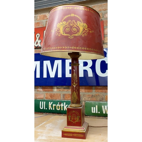 1125 - Good quality antique toleware table lamp and shade, with gilt decoration on a red ground, 79cm high