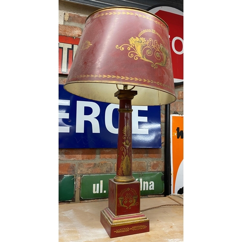 1125 - Good quality antique toleware table lamp and shade, with gilt decoration on a red ground, 79cm high