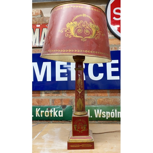 1125 - Good quality antique toleware table lamp and shade, with gilt decoration on a red ground, 79cm high