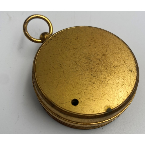 361 - Antique gilt cased pocket barometer, 48mm diameter