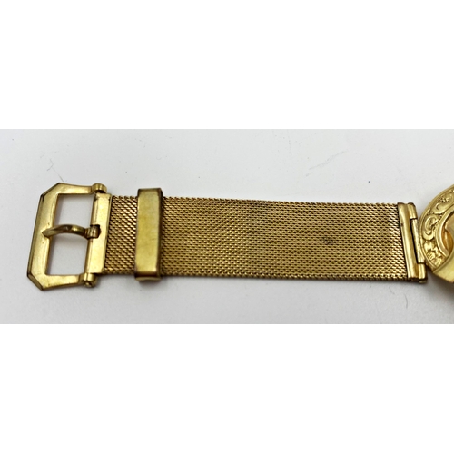 318 - Yellow metal stylised bracelet, with twin pierced scrolled hinged centre, on a watch type strap, mar... 