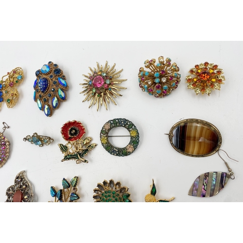 336 - Large collection of costume jewellery to include a good quantity of brooches, necklaces, pin badges ... 