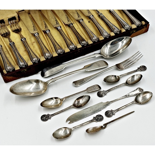 274 - Pair of Victorian silver fiddle serving spoons, with five crested teaspoons, dessert fork, serrated ... 