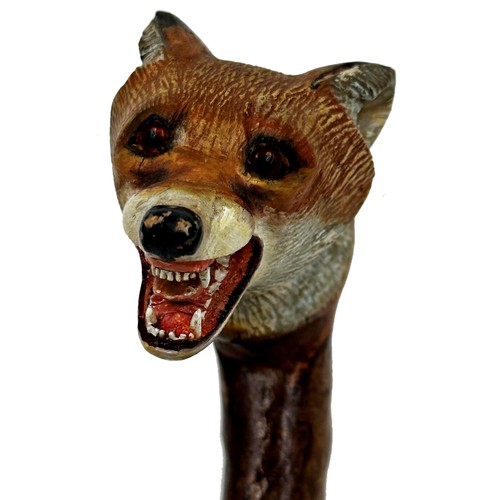 185 - Exceptional quality hand carved walking stick, with fox head knop, open mouth with teeth and glass e... 