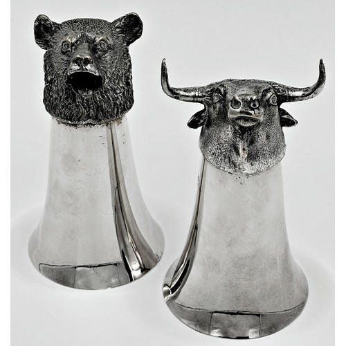 251 - Two silver plated novelty stirrup cups of a bear and a bull, each 14cm high