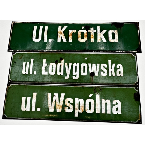 1109 - Three Polish enamel street signs in green and white, 16 x 60cm, 16.5 x 65cm and 16 x 60cm respective... 