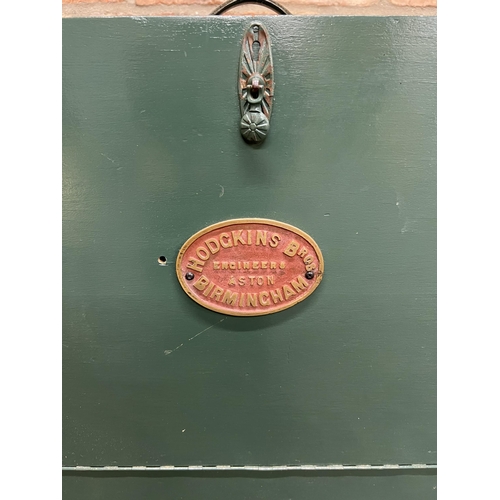 1235 - Hodgkin Bros of Birmingham engineers cabinet with green painted finish, the fall front enclosing tea... 