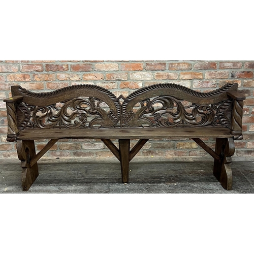 1363 - 19th century Chinese hardwood bench of slim proportions, the backrest carved with coiled serpents wi... 