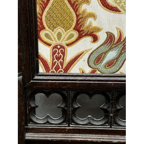 1369 - Good late 19th century Arts and Crafts screen, fitted with a silkwork panel over a repeating glaze s... 