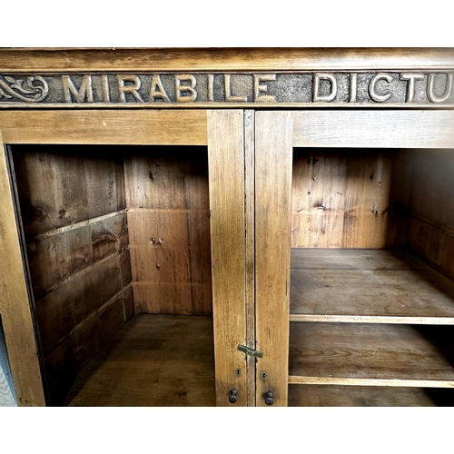 1370 - Good quality early 20th century pine cupboard, carved 'MIRABILE DICTU' to cornice, twin doors enclos... 