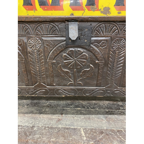 1372 - 17th century oak coffer, three arcaded carved panel front, hinged lid, 66cm high x 146cm long