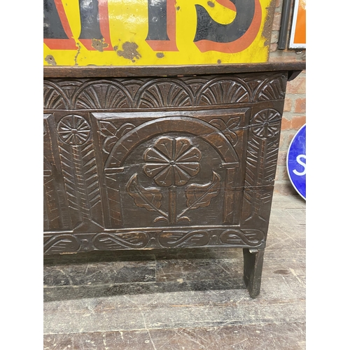 1372 - 17th century oak coffer, three arcaded carved panel front, hinged lid, 66cm high x 146cm long