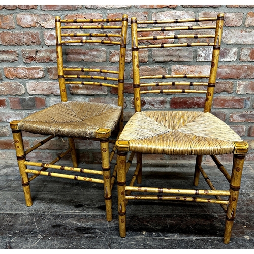 1296 - Pair of Regency painted faux bamboo dining chairs with rush seats (2).