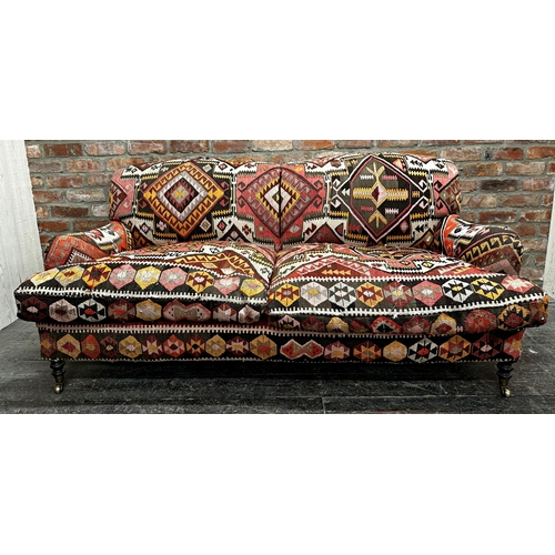 1300 - George Smith - Kelim or Kilim upholstered sofa, with feather stuffed cushions on turned front legs a... 