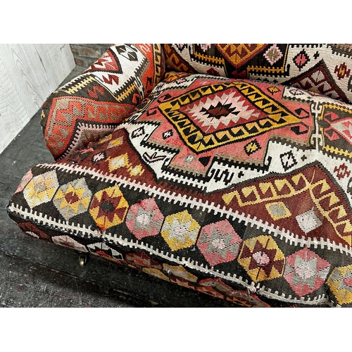 1300 - George Smith - Kelim or Kilim upholstered sofa, with feather stuffed cushions on turned front legs a... 