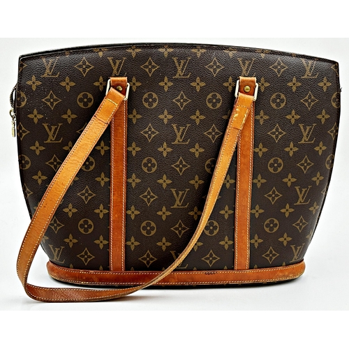 A classic Louis Vuitton Babylone tote bag in brown monogram canvas
