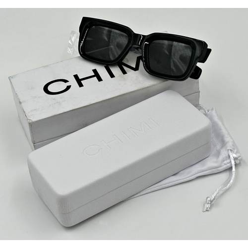 259 - A pair of Chimi sunglasses in black. Comes with branded hard case, soft pouch, cleaning cloth and pr... 