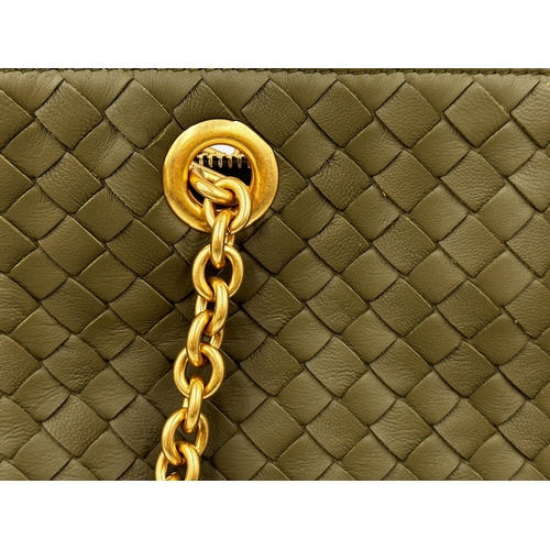 260 - A Bottega Veneta Intrecciato Leather Shoulder Bag in khaki. 
Hardware in gilt metal with leather and... 