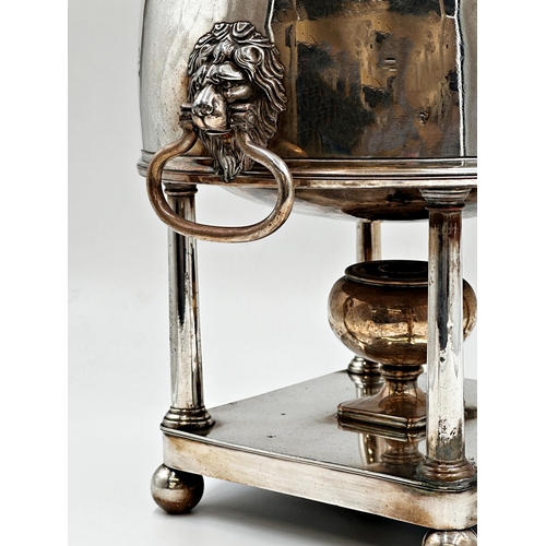 74 - Silver Plate Regency Spirit Kettle. Set upon four column pedestal and ball feet. With  Lions Head ca... 