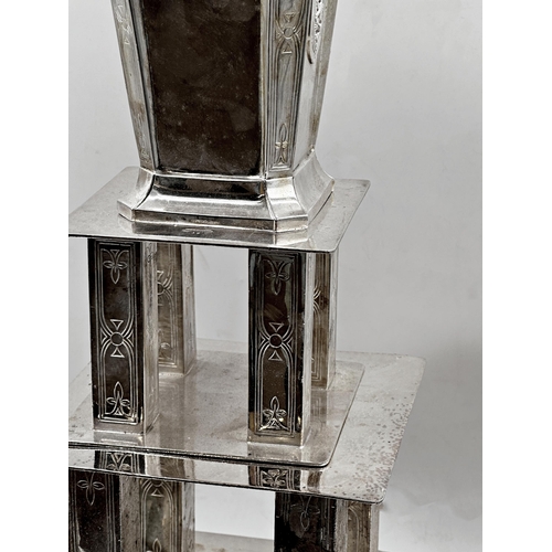 80 - Arts and Crafts Four Tier Silver Plate Cake stand, with engraved Celtic floral motifs and applied Sh... 