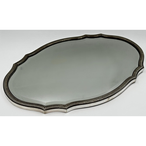 103 - Victorian Beveled Mirror Plateau with beaded decoration to border.
h2 x l51 x w35cm