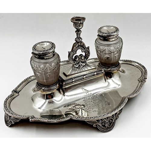 148 - Good quality Victorian silver desk standish, fitted with two glass inkwells and a taper stick, engra... 