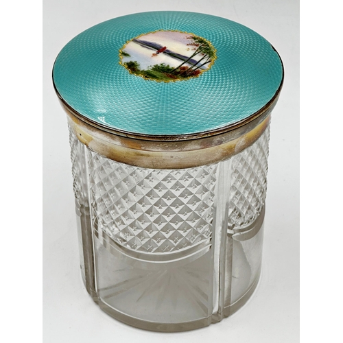 156 - Good 1920s silver and guilloche enamel lidded cut glass jar, the lid centrally decorated with an exo... 