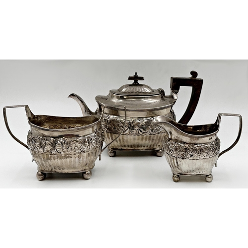 159 - George III silver three piece boat-shaped tea service, with chased and fluted decoration, makers mar... 