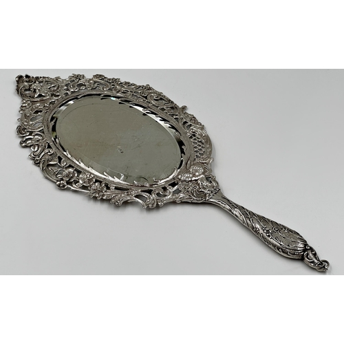 168 - Good quality late Victorian silver hand mirror, pierced with cherubs and flowers, maker David Bridge... 