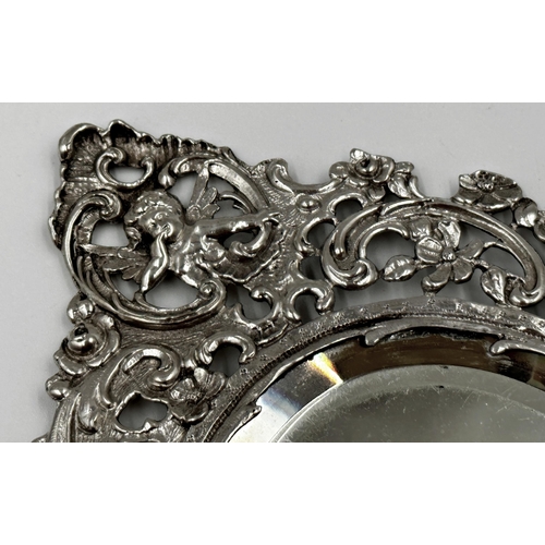 168 - Good quality late Victorian silver hand mirror, pierced with cherubs and flowers, maker David Bridge... 